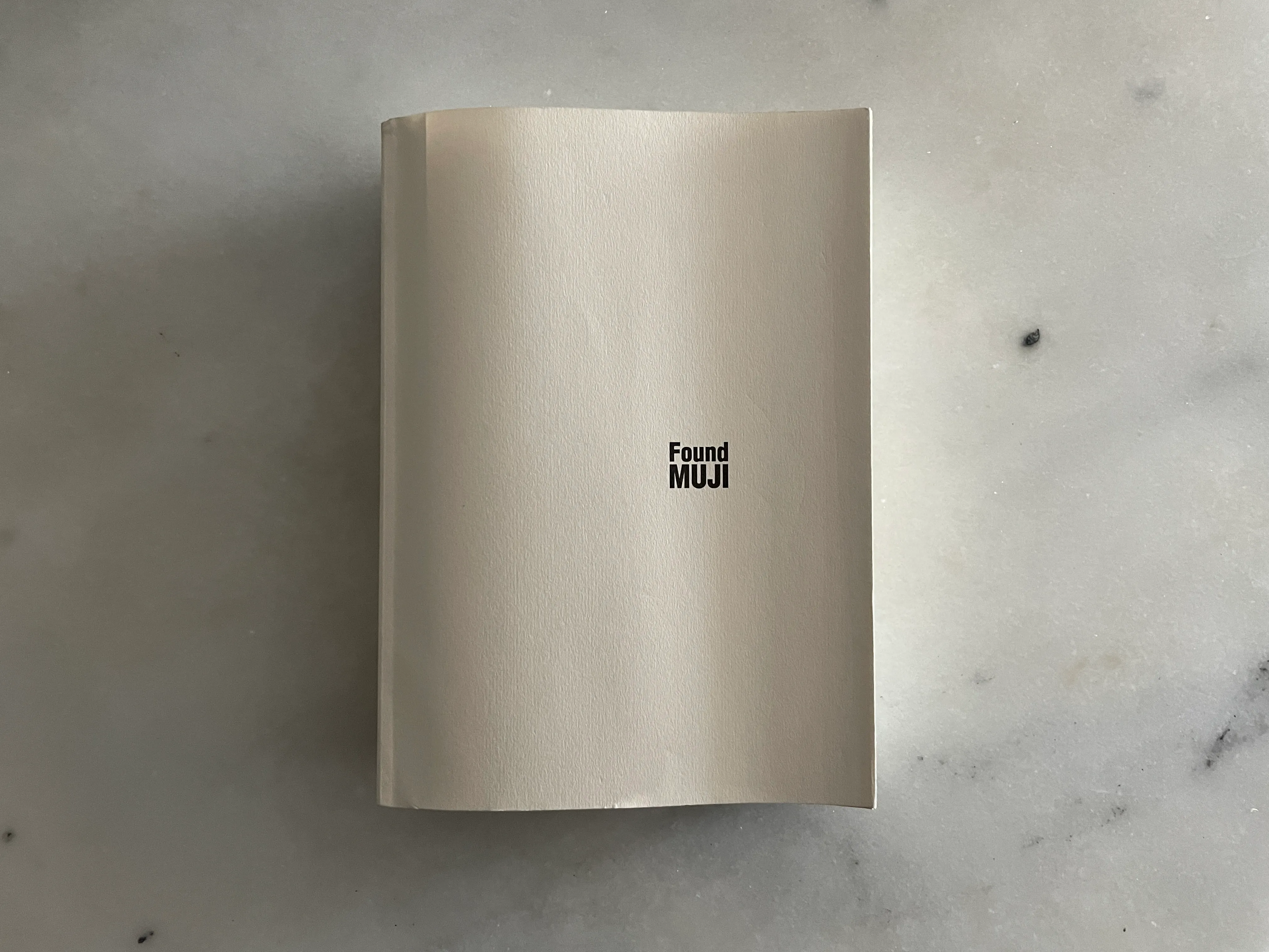 A photograph of the cover of Found Muji.