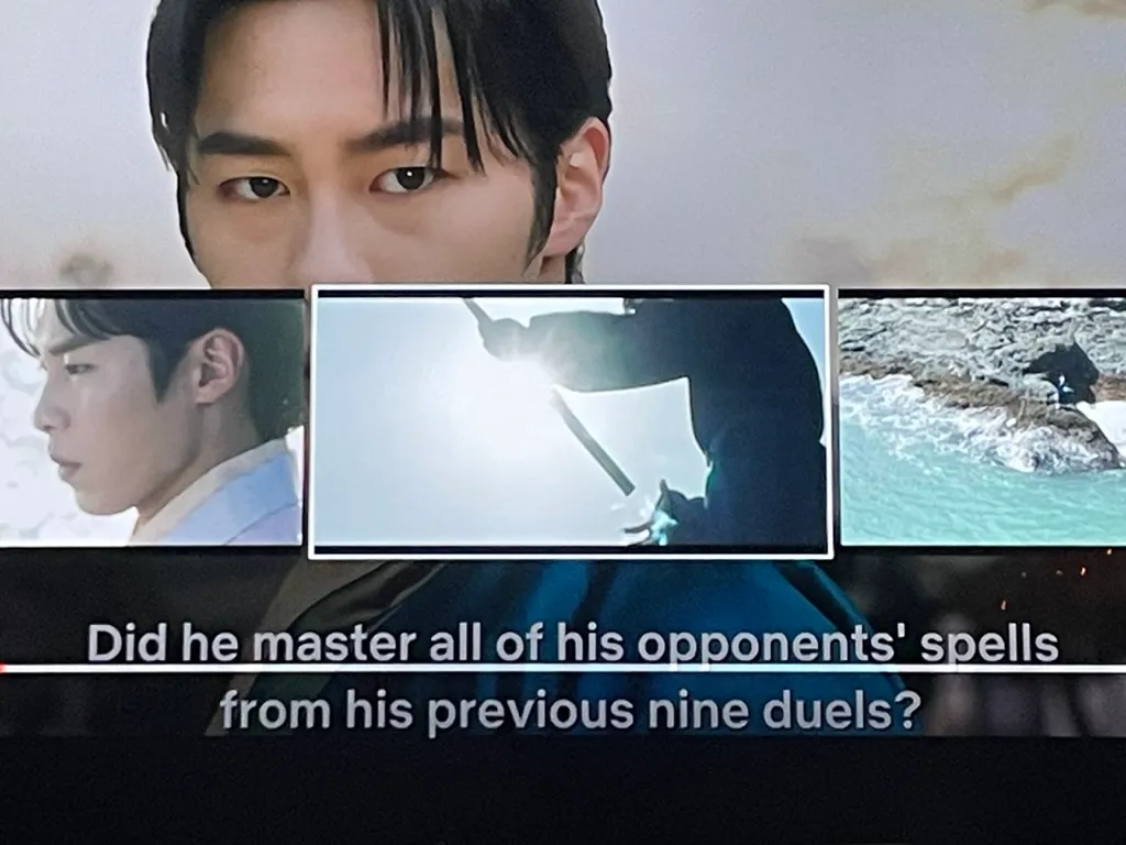 A screenshot of a still from a movie. The subtitling reads: 'Did he master all of his opponents' spells from his previous nine duels?'